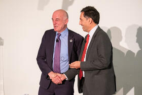 Dr David Nabarro (left) receives the Leverhulme medal from LSTM Director David Lalloo